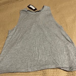 NWT sleeveless shirt twist to back.